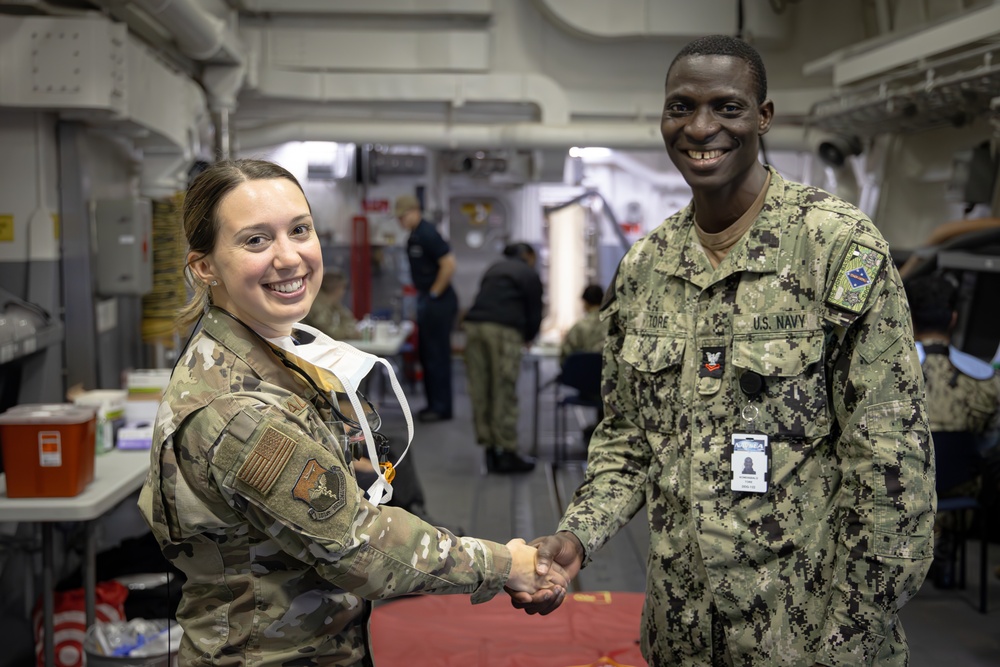 Guard and Reservists from Bangor Air National Guard Base Visit USS John Basilone