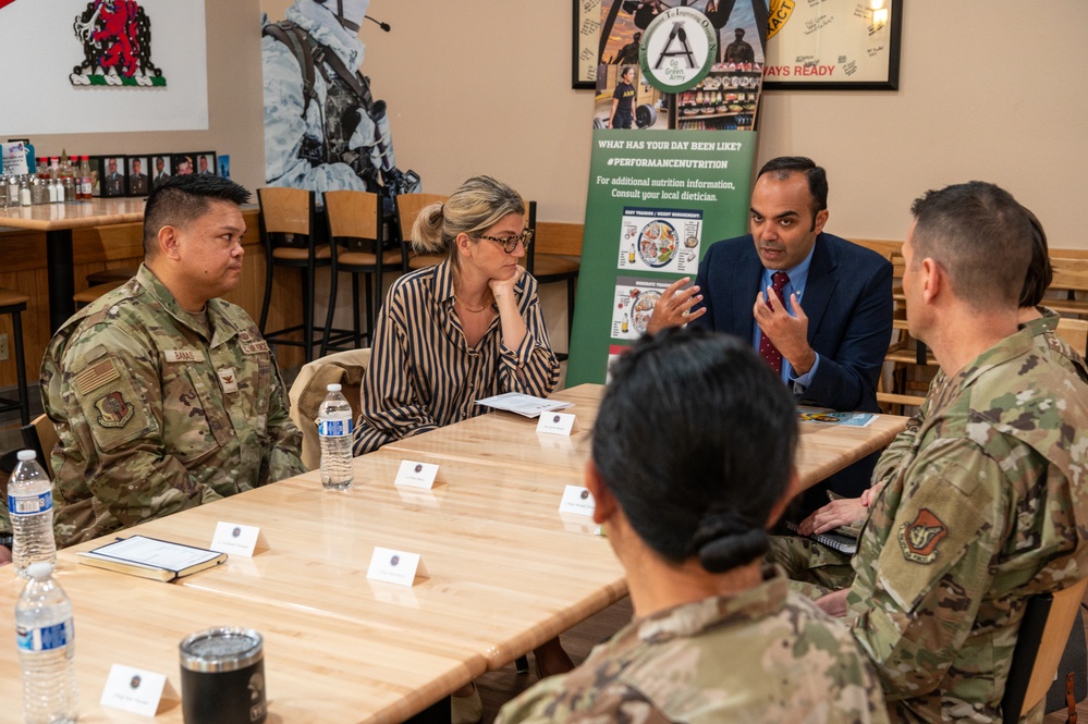 Representatives of the Consumer Financial Protection Bureau visit with JBER leadership, servicemembers, and military spouses