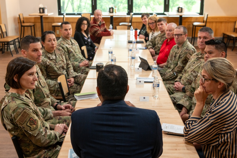 Representatives of the Consumer Financial Protection Bureau visit with JBER leadership, servicemembers, and military spouses