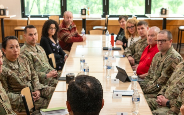 Representatives of the Consumer Financial Protection Bureau visit with JBER leadership, servicemembers, and military spouses