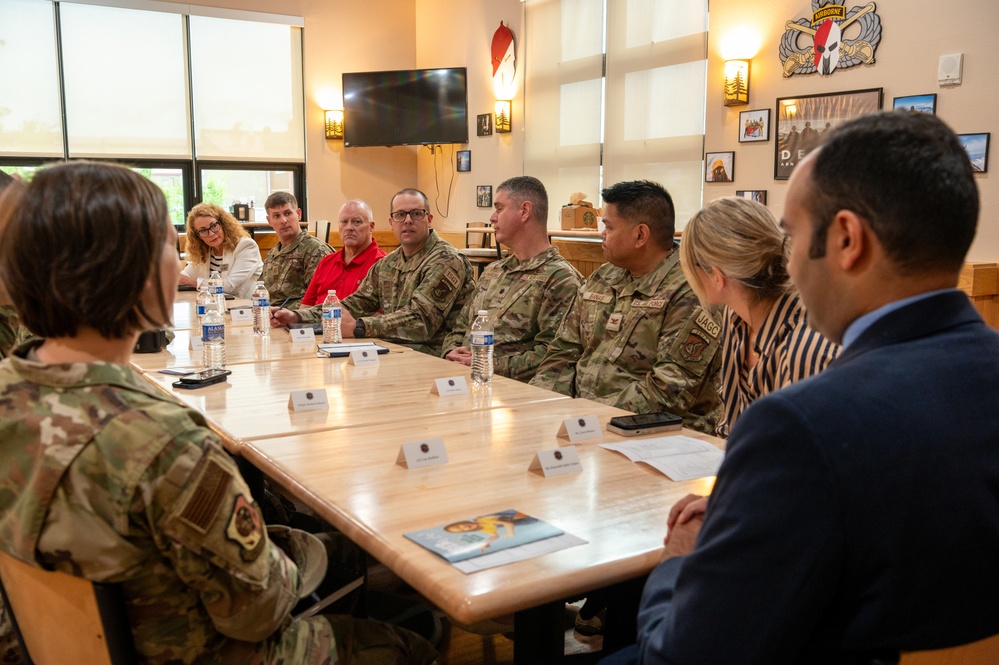 Representatives of the Consumer Financial Protection Bureau visit with JBER leadership, servicemembers, and military spouses