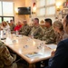 Representatives of the Consumer Financial Protection Bureau visit with JBER leadership, servicemembers, and military spouses