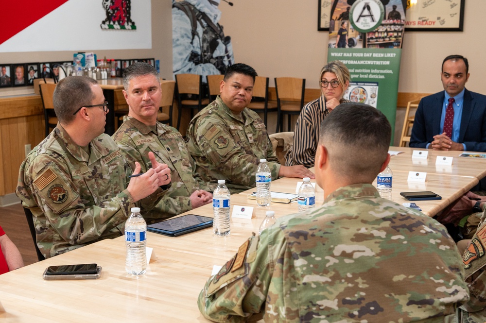 Representatives of the Consumer Financial Protection Bureau visit with JBER leadership, servicemembers, and military spouses