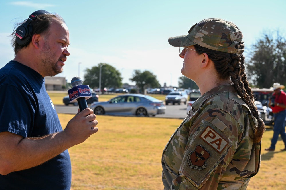 97th AMW Airmen meet with media during the 26th Annual Cattle Drive