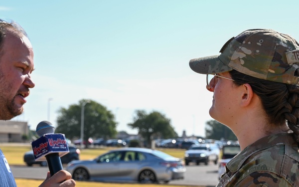97th AMW Airmen meet with media during the 26th Annual Cattle Drive