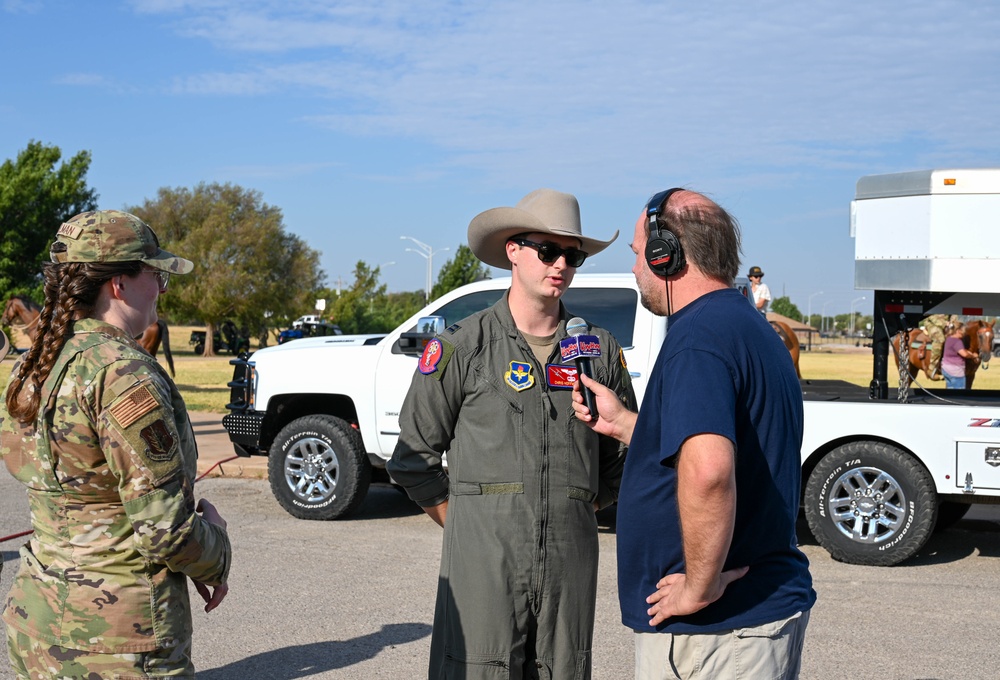 97th AMW Airmen meet with media at the 26th Annual Cattle Drive
