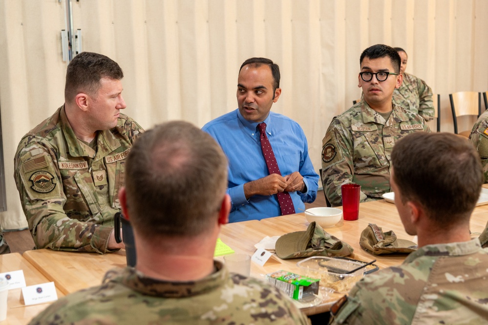 Representatives of the Consumer Financial Protection Bureau visit with JBER leadership, servicemembers, and military spouses