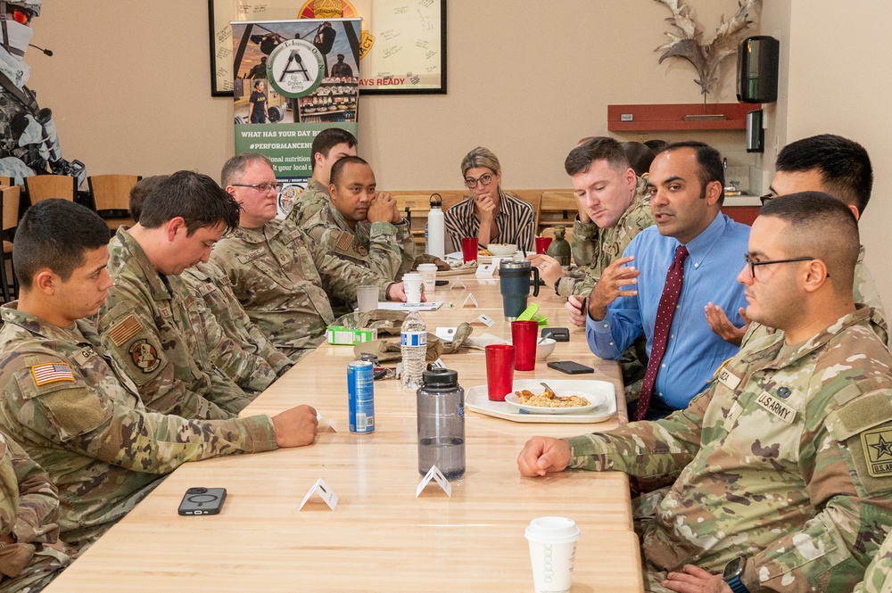 Representatives of the Consumer Financial Protection Bureau visit with JBER leadership, servicemembers, and military spouses