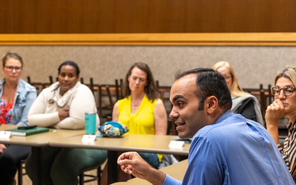Representatives of the Consumer Financial Protection Bureau visit with JBER leadership, servicemembers, and military spouses
