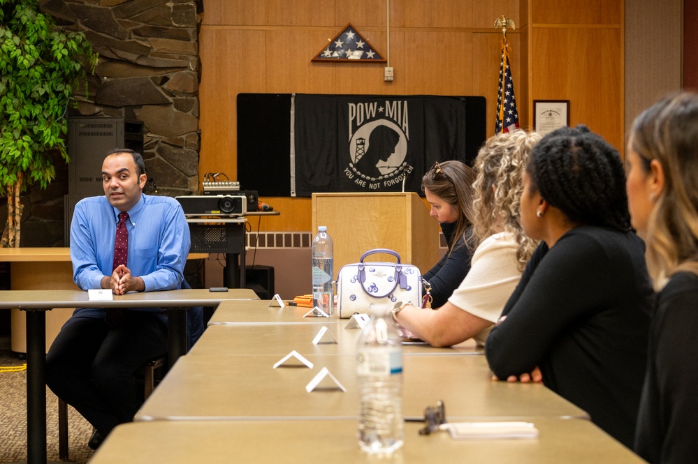 Representatives of the Consumer Financial Protection Bureau visit with JBER leadership, servicemembers, and military spouses