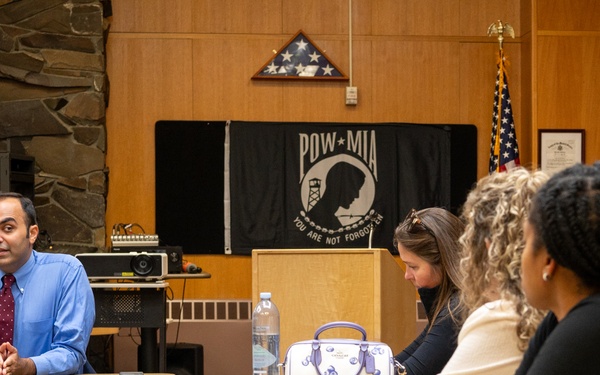 Representatives of the Consumer Financial Protection Bureau visit with JBER leadership, servicemembers, and military spouses