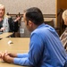 Representatives of the Consumer Financial Protection Bureau visit with JBER leadership, servicemembers, and military spouses