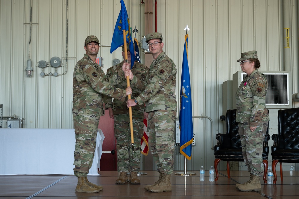 4 MXG holds a change of command ceremony