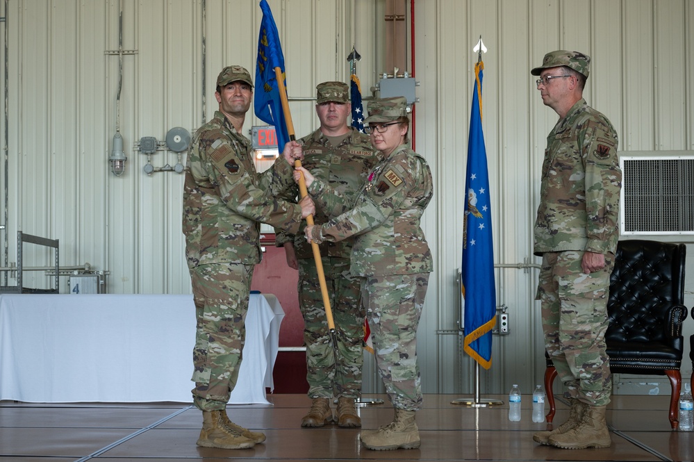 4 MXG holds a change of command ceremony