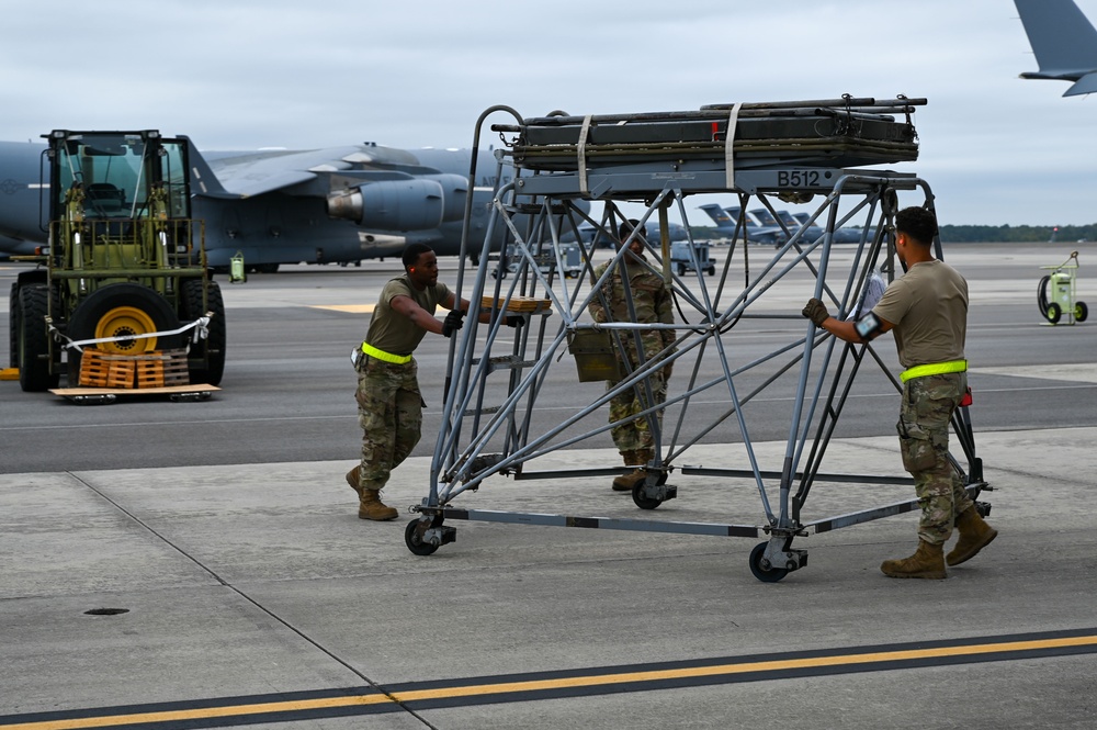 437th APS load cargo during exercise EXPLODEO 2.0