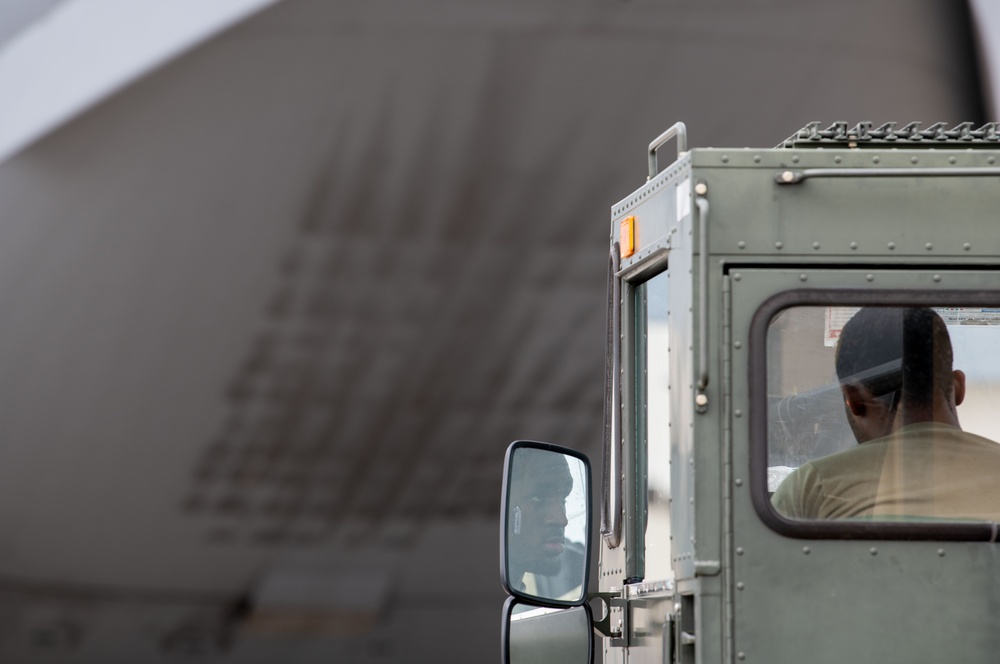 437th APS load cargo during exercise EXPLODEO 2.0