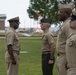 U.S. Navy Chief Religious Program Specialist Kenneth Armstead receives the Fleet Marine Force Warfare Insignia