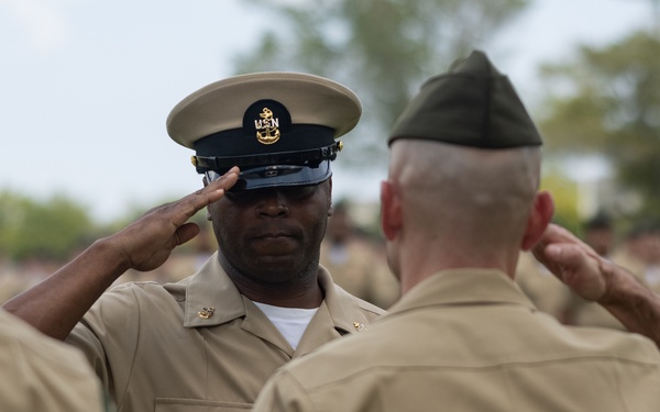 U.S. Navy Chief Religious Program Specialist Kenneth Armstead receives the Fleet Marine Force Warfare Insignia