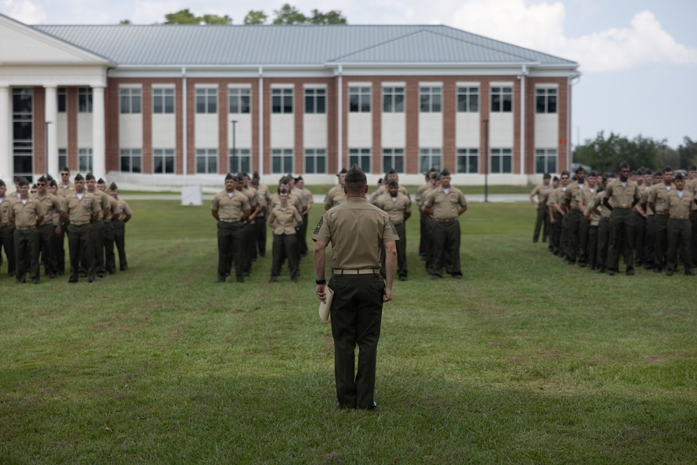 U.S. Navy Chief Religious Program Specialist Kenneth Armstead receives the Fleet Marine Force Warfare Insignia