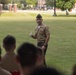 U.S. Navy Chief Religious Program Specialist Kenneth Armstead receives the Fleet Marine Force warfare insignia