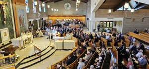 Monsignor Steve Kachel speaks about Sgt. Jack Hohlfeld during Mass of Christian Burial Service for World War II Bataan Death March survivor