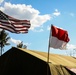 The flags of the United States of America and the Republic of Indonesia fly above Sekolah Dasar Negeri 2, during Super Garuda Shield 2024