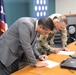 Brig. Gen. Daniel Hibner, Commander of the South Atlantic Division of the U.S. Army Corps of Engineers (USACE) and  Josué A. Colón Ortiz, Executive Director of the Puerto Rico Electric Power Authority (PREPA)sign a memorandum of understanding