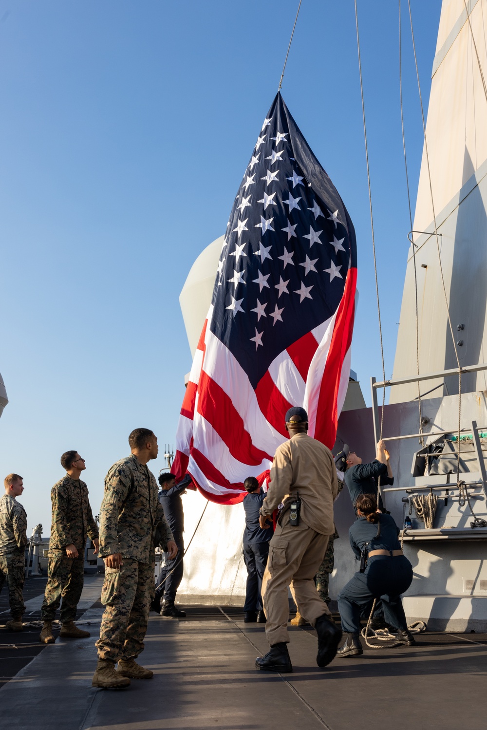 USS Green Bay conducts a Pass and Review while departing Super Garuda Shield 2024