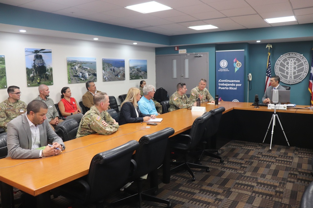 Brig Gen Hibner receives a briefing during the sign of the Collaborative Agreement between the US Army Corps of Engineers and the Puerto Rico Electric Power Authority