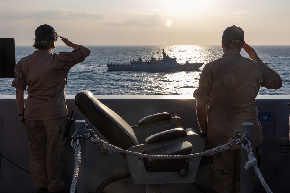 USS Green Bay conducts a Pass and Review while departing Super Garuda Shield 2024