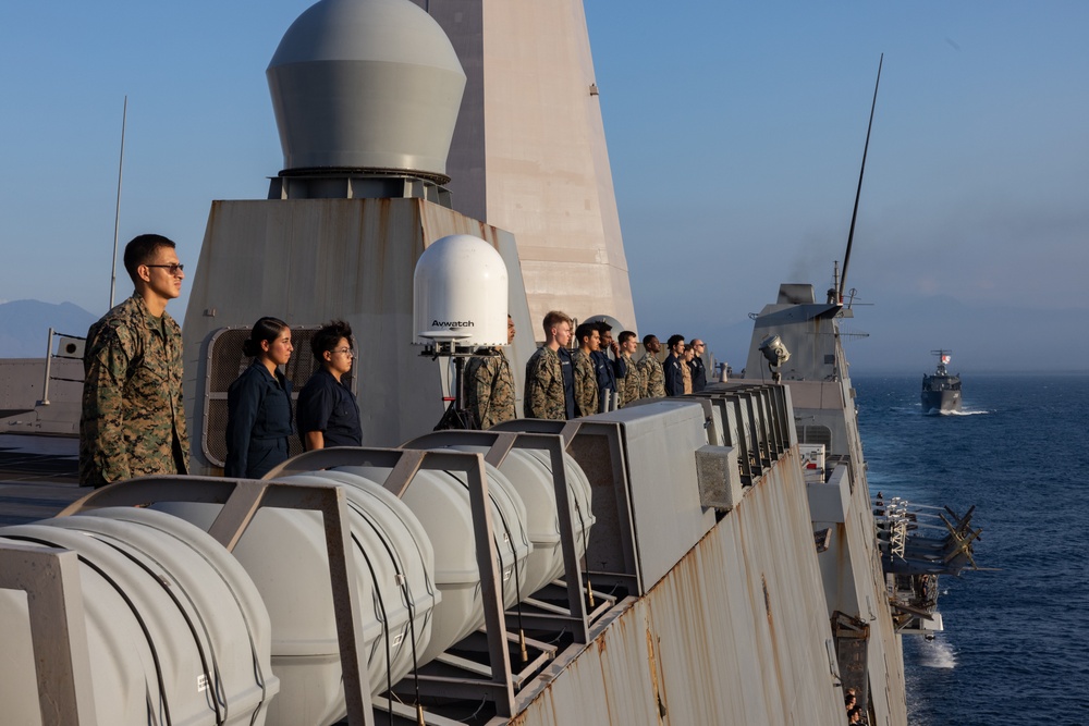 USS Green Bay conducts a Pass and Review while departing Super Garuda Shield 2024