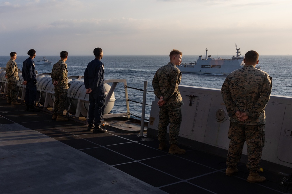 USS Green Bay conducts a Pass and Review while departing Super Garuda Shield 2024