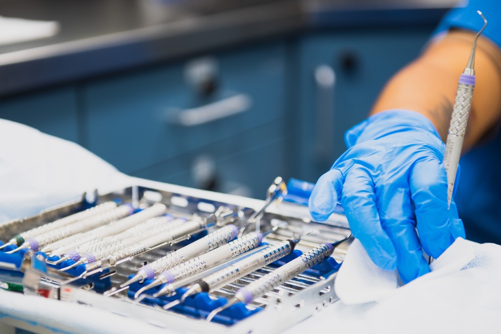 USS Ronald Reagan (CVN 76) Sailors conduct dental procedure
