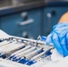 USS Ronald Reagan (CVN 76) Sailors conduct dental procedure