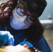 USS Ronald Reagan (CVN 76) Sailors conduct dental procedure