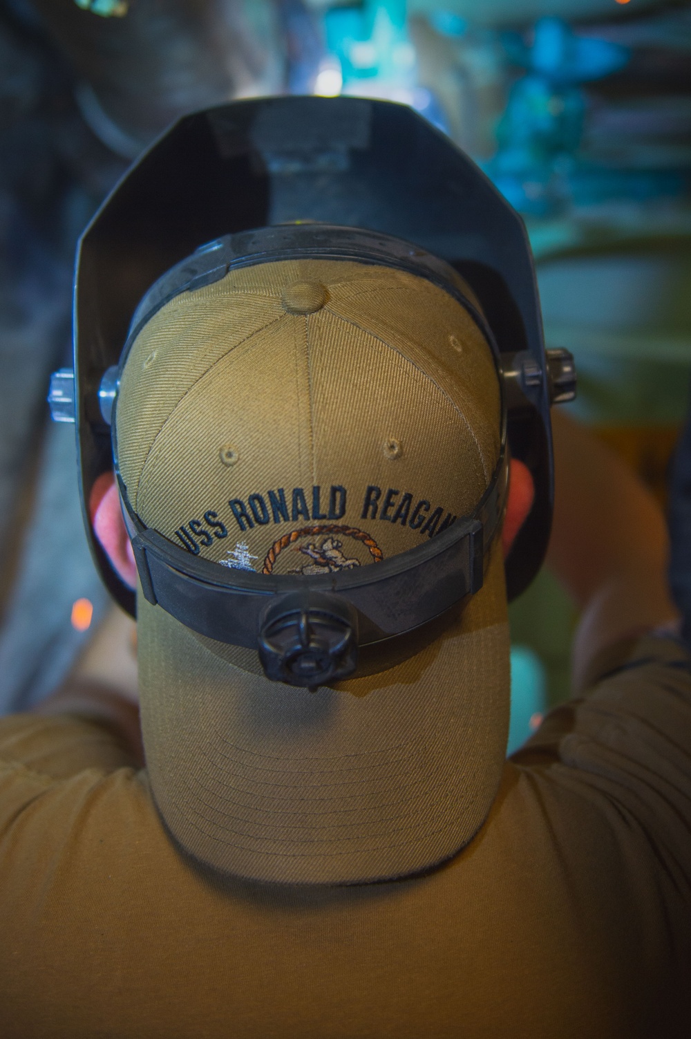 USS Ronald Reagan (CVN 76) Sailors perform repairs aboard USS Turner Joy (DD 951)