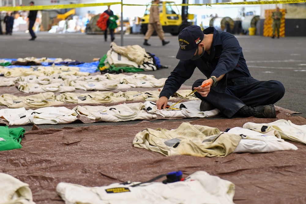 USS Ronald Reagan (CVN 76) Sailors conduct routine maintenance