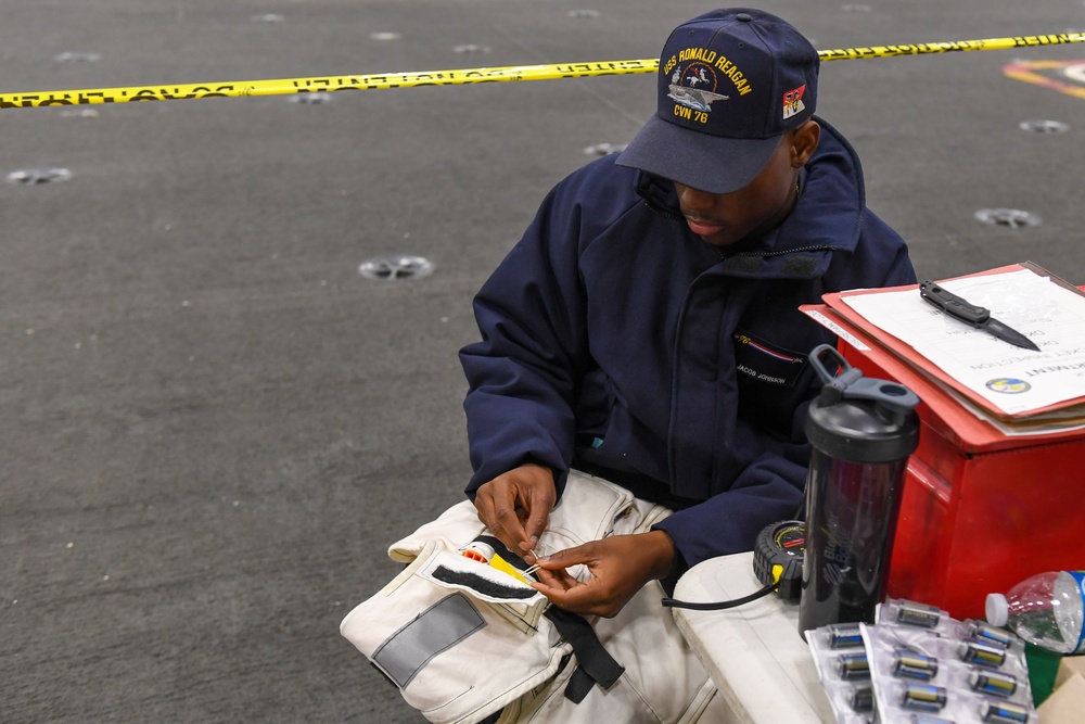 USS Ronald Reagan (CVN 76) Sailors conduct routine maintenance