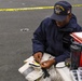 USS Ronald Reagan (CVN 76) Sailors conduct routine maintenance