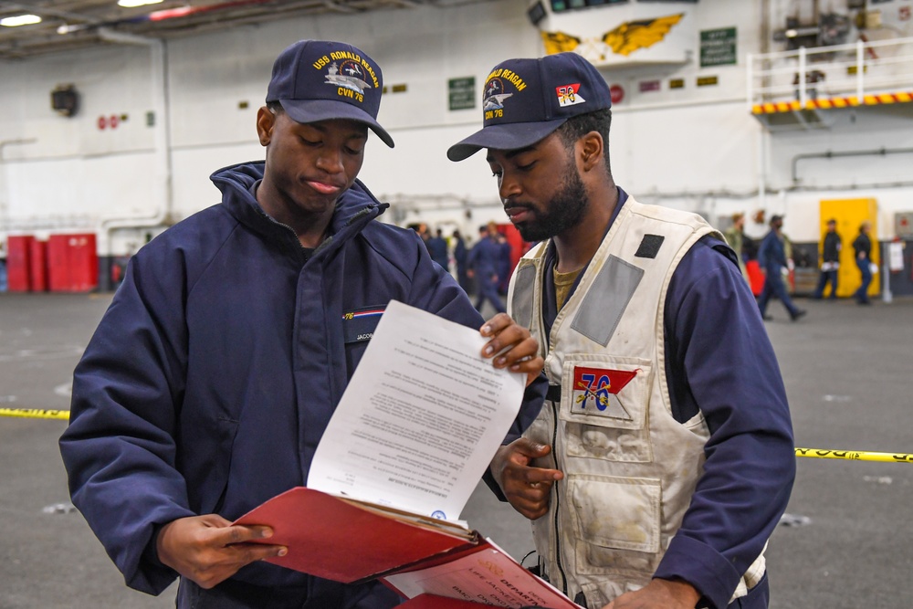 USS Ronald Reagan (CVN 76) Sailors conduct routine maintenance