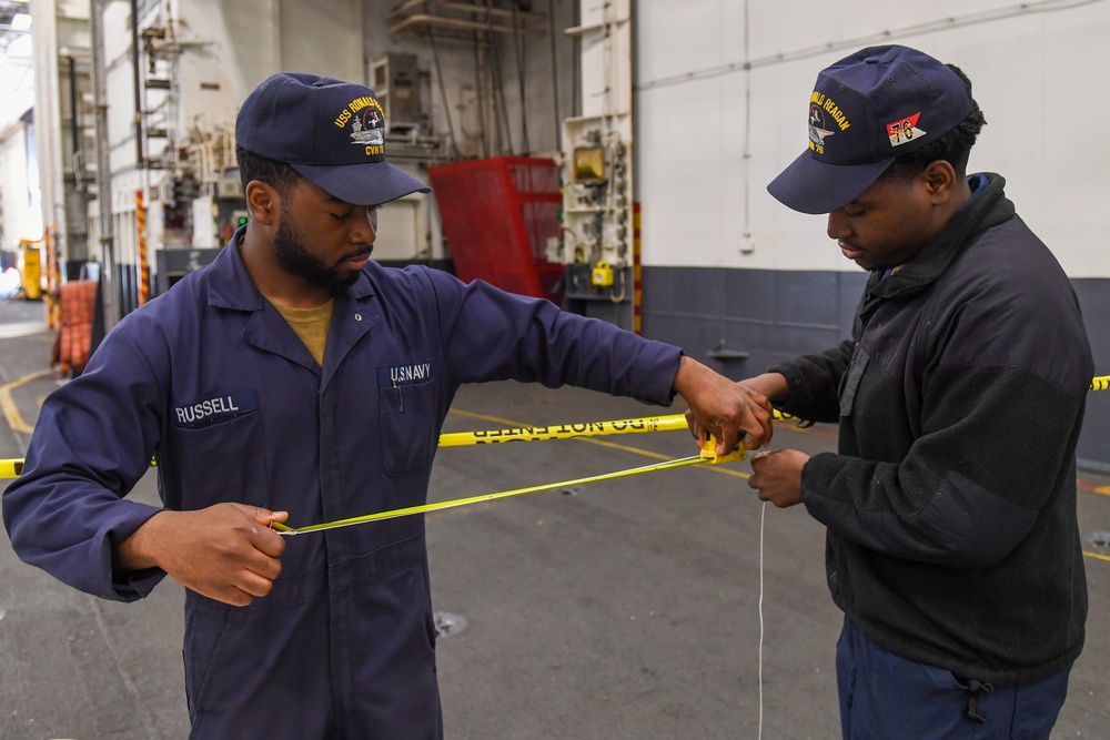 USS Ronald Reagan (CVN 76) Sailors conduct routine maintenance