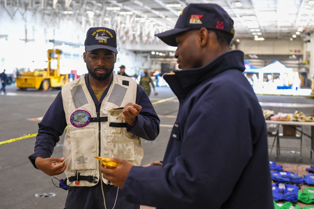 USS Ronald Reagan (CVN 76) Sailors conduct routine maintenance