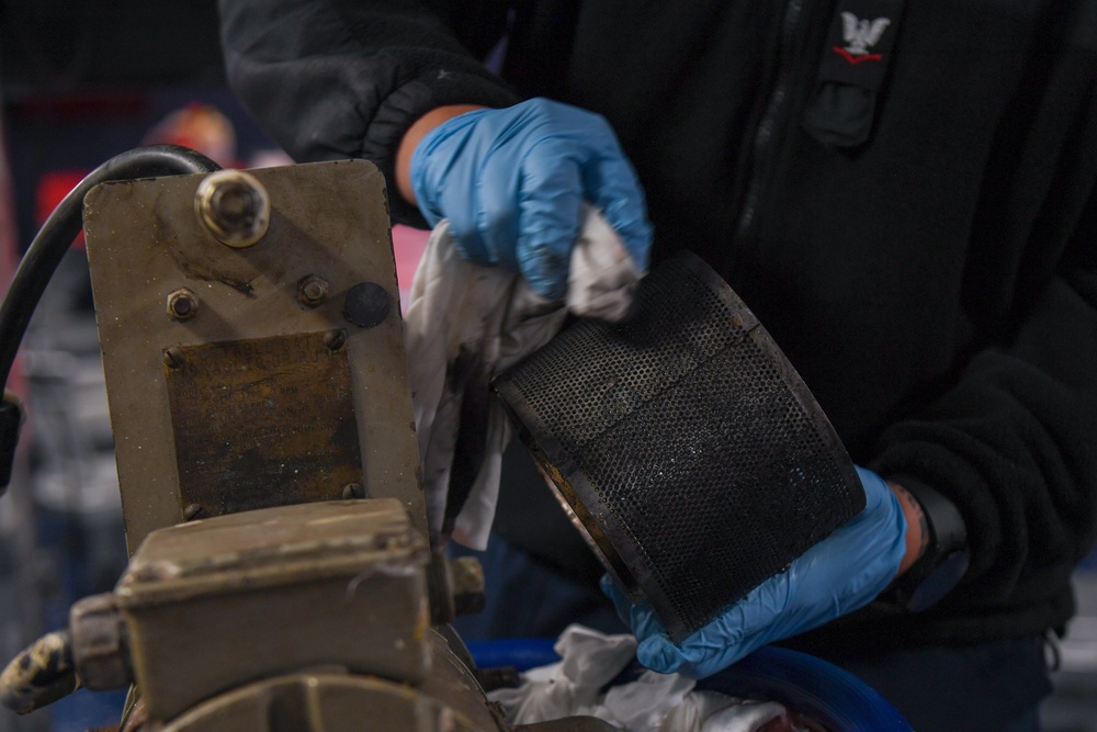 USS Ronald Reagan (CVN 76) Sailors conduct corrective maintenance