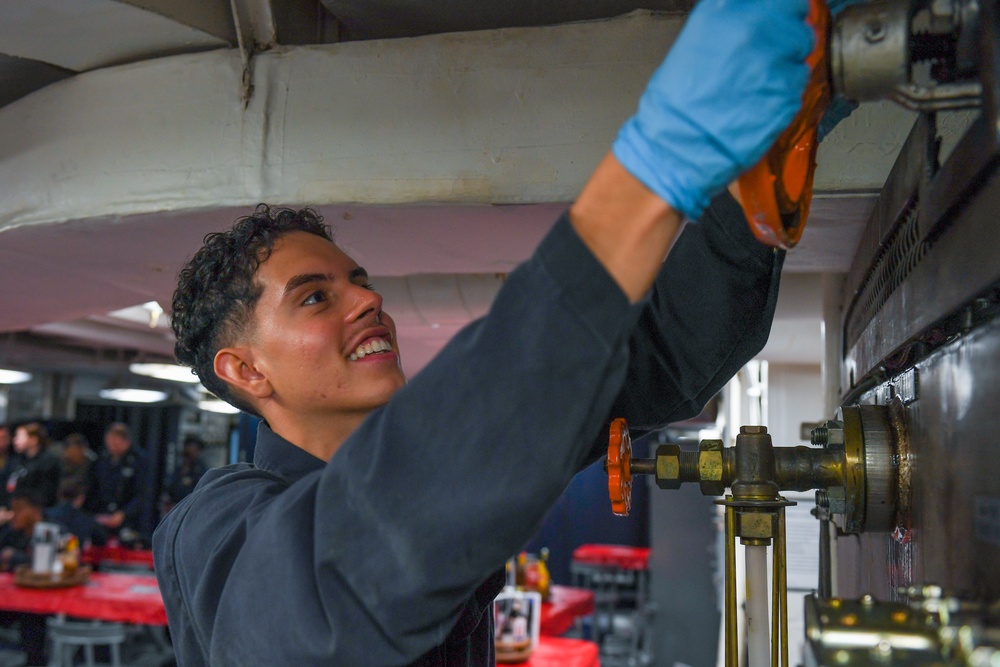 USS Ronald Reagan (CVN 76) Sailors conduct corrective maintenance