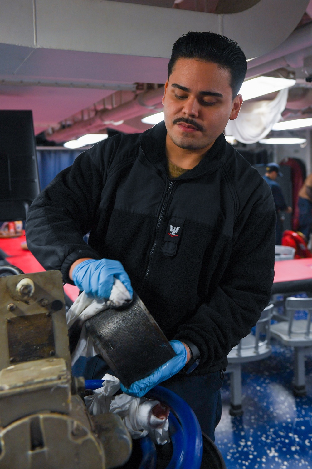 USS Ronald Reagan (CVN 76) Sailors conduct corrective maintenance