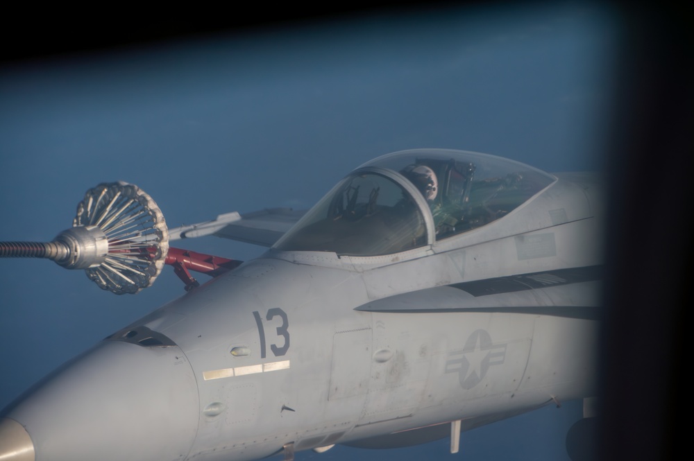 U.S. Marine F/A-18s and KC-130J conduct aerial refueling off the coast of Chile