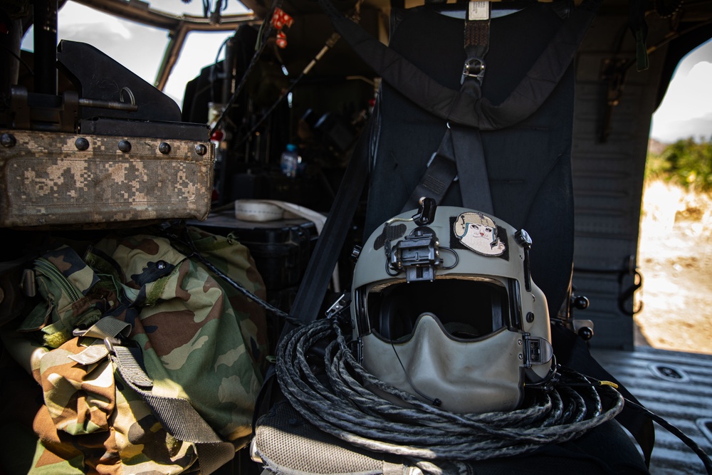 A U.S. Army UH-60 Black Hawk from Bravo Company, 2-25th Aviation Regiment, 25th Combat Aviation Brigade, awaits departure for the sling load training exercise during Super Garuda Shield 2024,