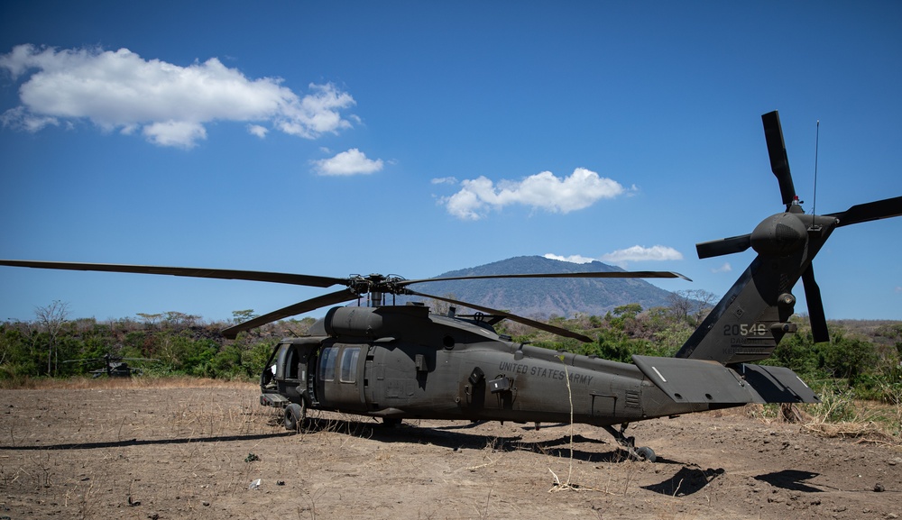 A U.S. Army UH-60 Black Hawk from Bravo Company, 2-25th Aviation Regiment, 25th Combat Aviation Brigade, awaits departure for the sling load training exercise during Super Garuda Shield 2024