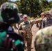 U.S. Army Spc. Biranna Ramirez briefs Members of the Indonesian National Armed Forces and Japanese Self Defence Force on the sling load training exercise during Super Garuda Shield 2024