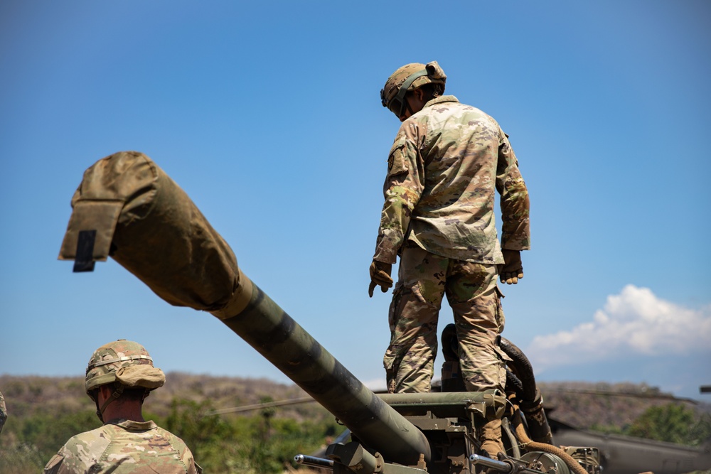 U.S. Army Soldiers from Bravo Company, 2-25th Aviation Regiment, 25th Combat Aviation Brigade, wait for the sling load training exercise to begin during Super Garuda Shield 2024, Sept. 1, 2024